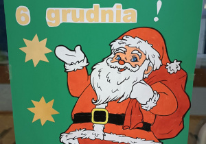 Plakat ze Świętym Mikołajem. Ho! Ho! Ho! Do zobaczenia 6 grudnia.
